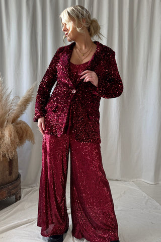 Millenium paljettihousut, red wine